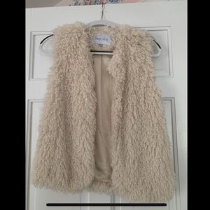 Cream fuzzy faux shearling vest from Lucy Paris